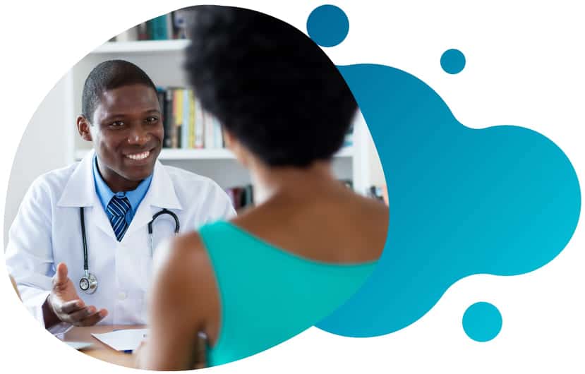 Patient Resources Clinical Trials – Conquest Research A doctor explaining to a patient what to expect during a clinical research trial